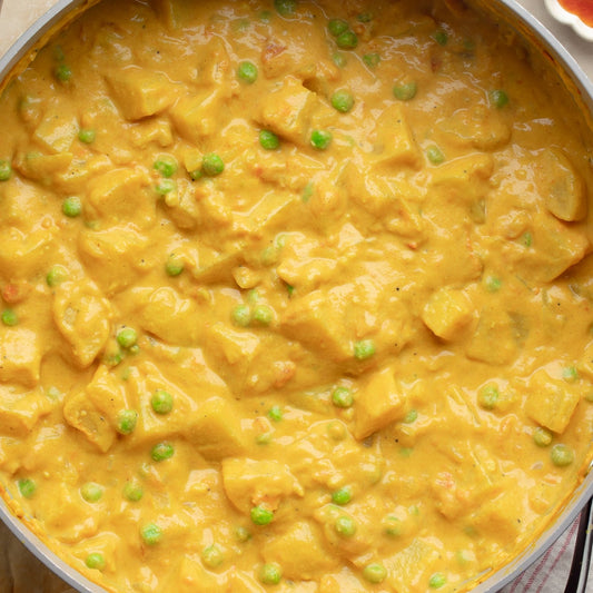 Easy vegan potato curry in a bowl with rice